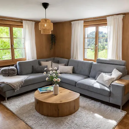 Cozy Alpine Retreat With Mountain View Гштад